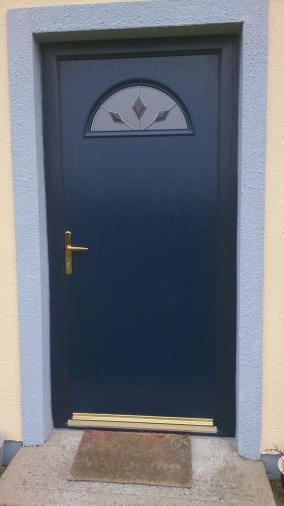 Blue door with geometric window design